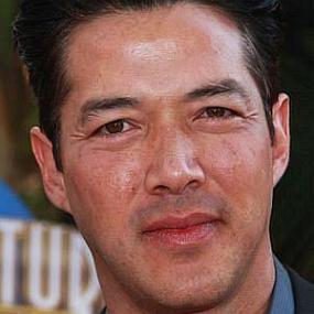 height of Russell Wong